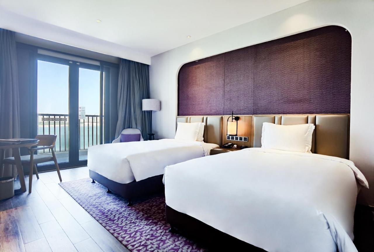 Crowne Plaza Qingdaoorientalmoviemetropolis By Ihg Hotel ภายนอก รูปภาพ