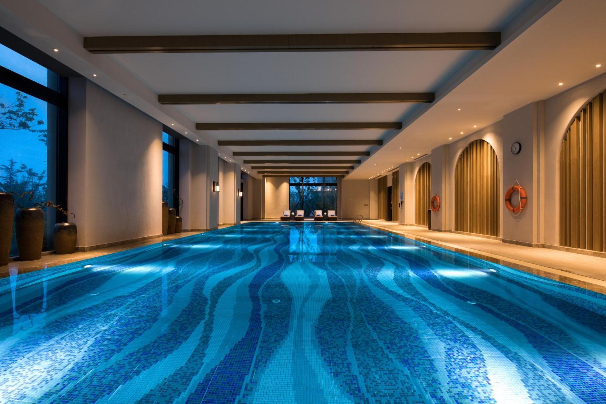 Crowne Plaza Qingdaoorientalmoviemetropolis By Ihg Hotel ภายนอก รูปภาพ